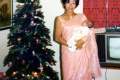 057-1975-Holding-baby-Sharon-at-Christmas-Toh-Avenue-Singapore